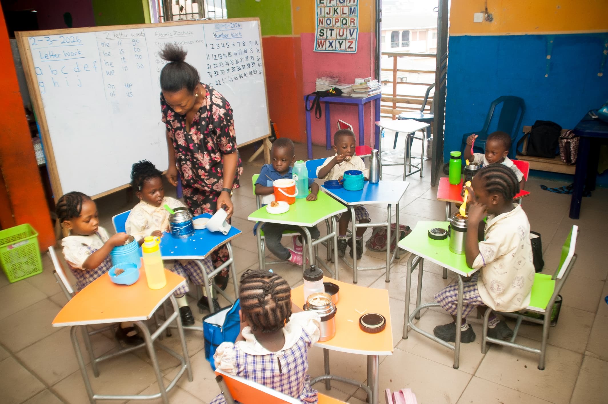 Teacher with Nursery Class
